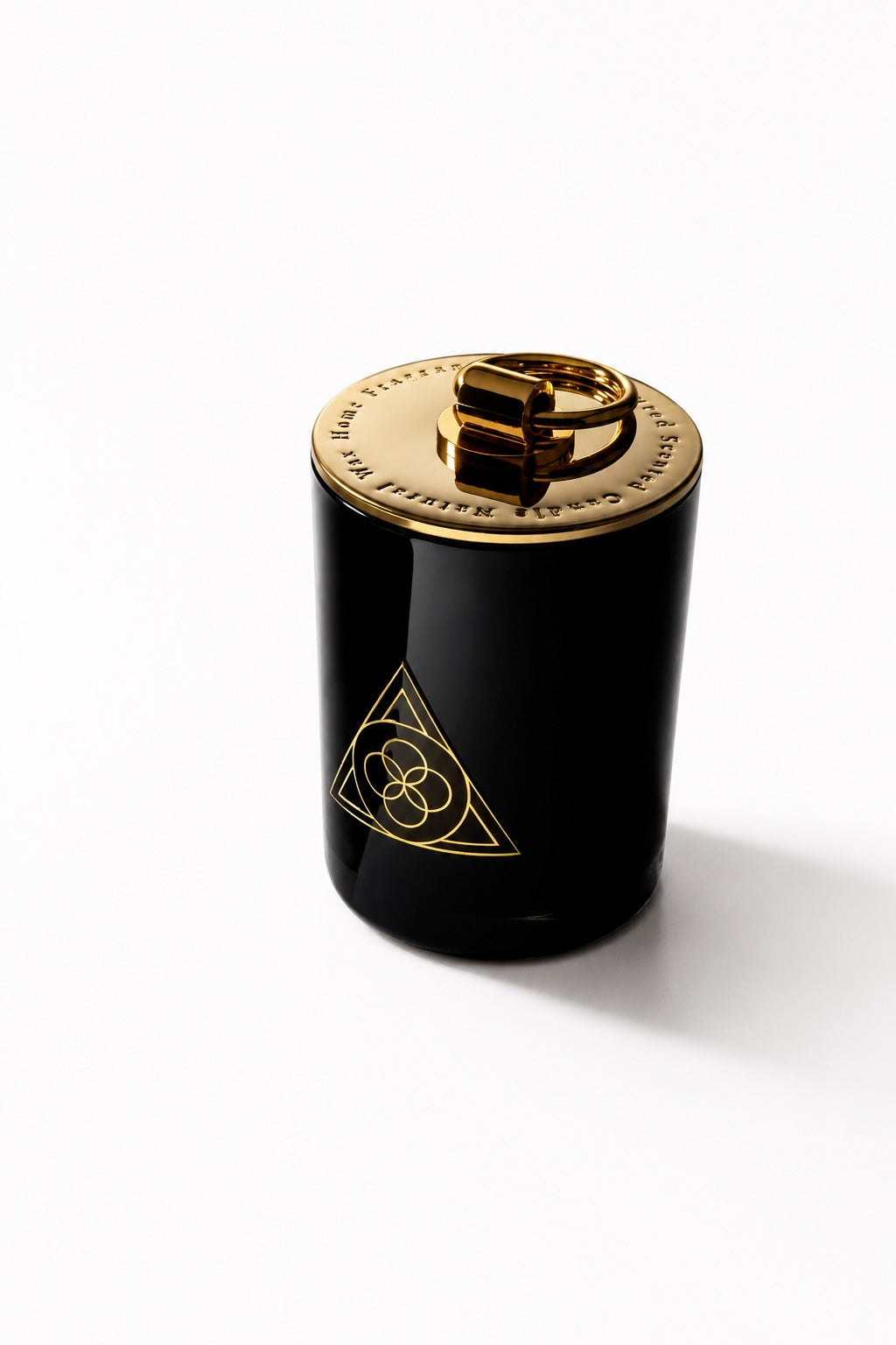 Détail de la bougie parfumée White Tea ESSENCE1989 en verre noir mat